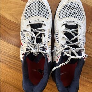 White and Navy Blue Athletic Shoes